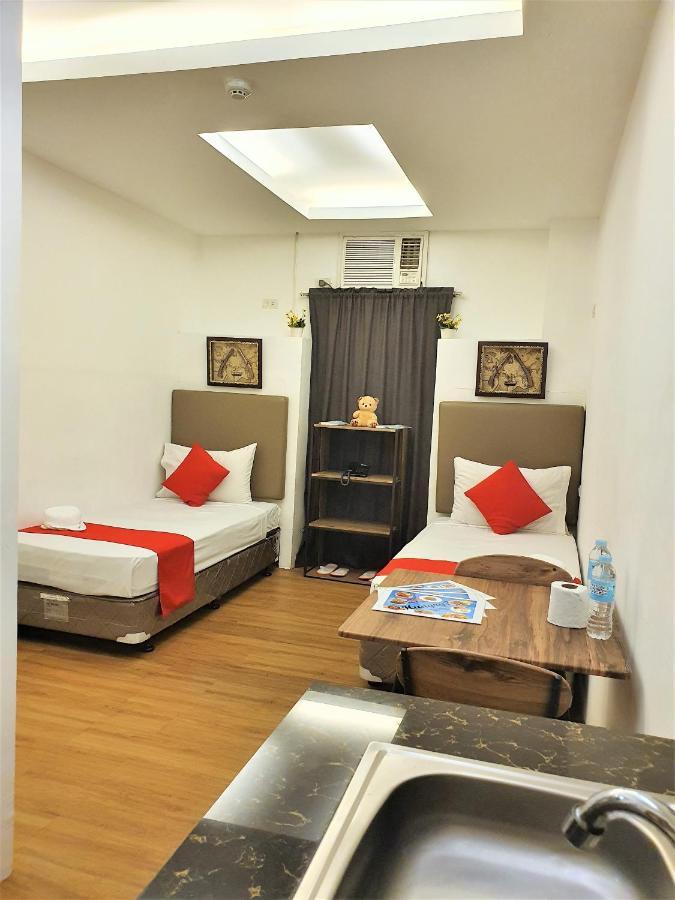 קואזון סיטי Spiral Suites Hotel מראה חיצוני תמונה