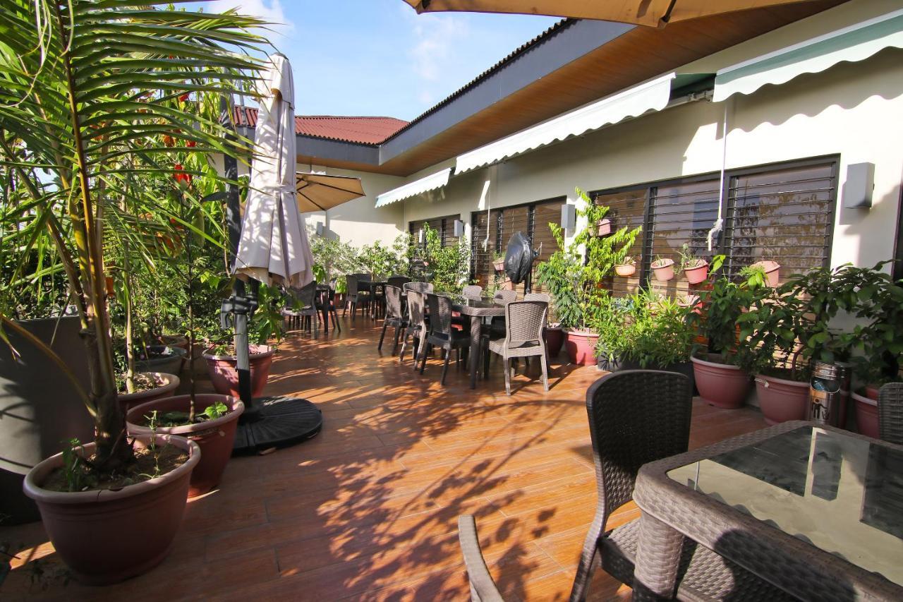 קואזון סיטי Spiral Suites Hotel מראה חיצוני תמונה